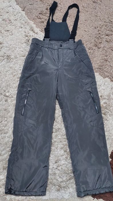 Продам зимние штаны 140-146см