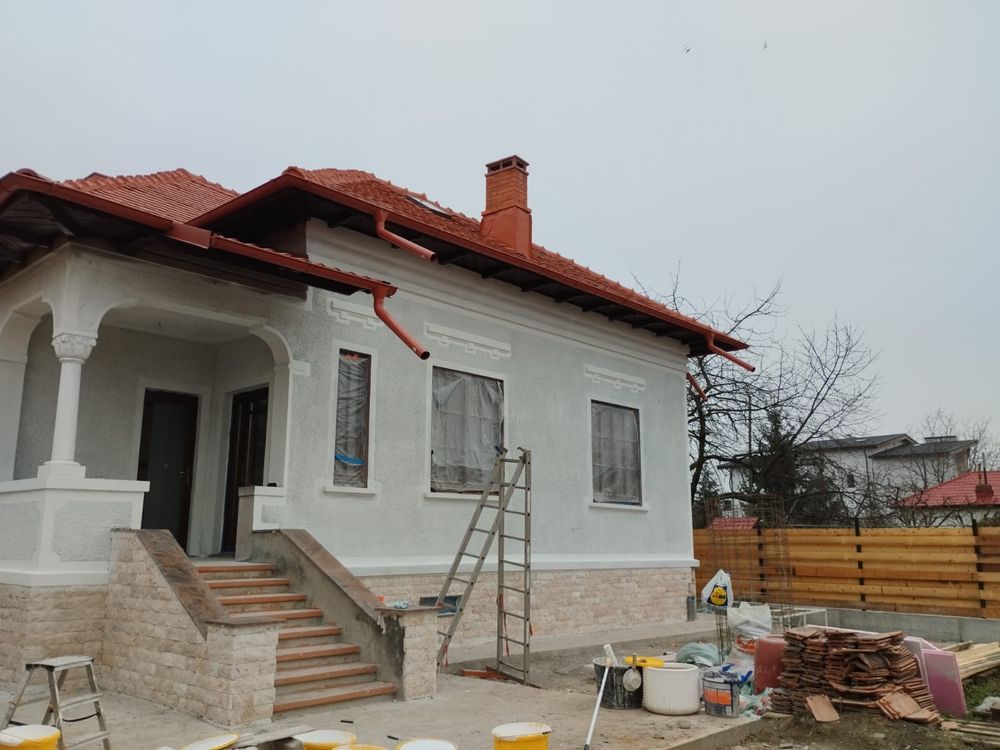 Constructii case la rosu si finisaje