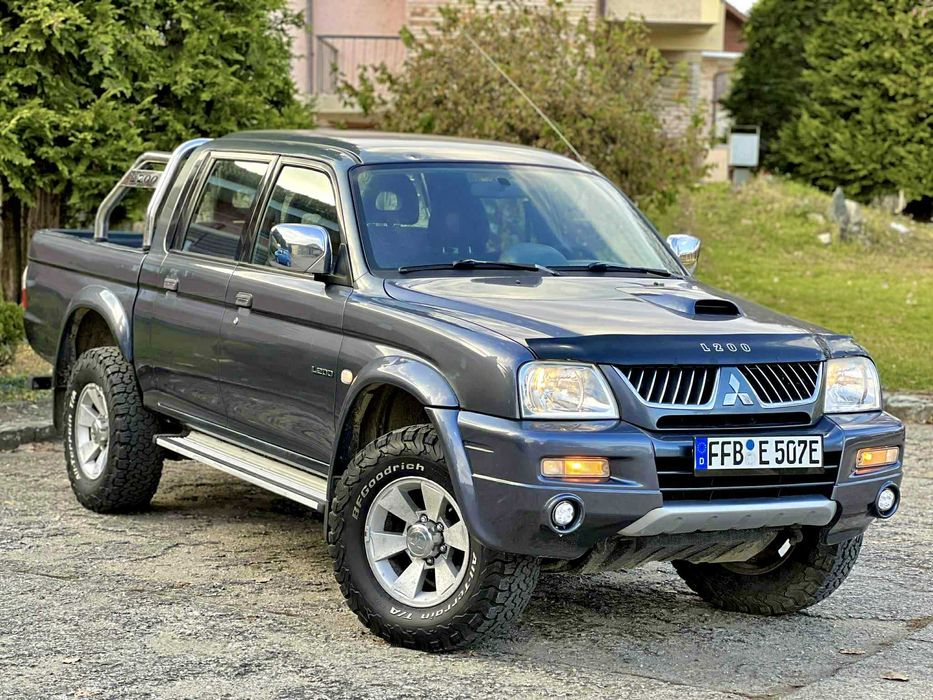 - IMPECABIL Mitsubishi L200 2.5Di-D133cp DAKAR EDITION Full