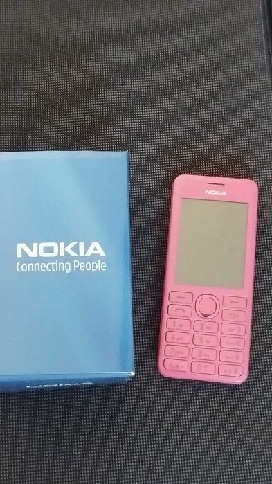 Vand nokia Asha 206 roz in stare foarte buna NOU !!