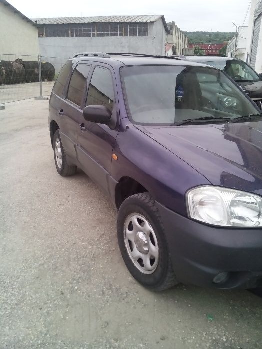 Mazda Tribute 2,0 I 124к.с