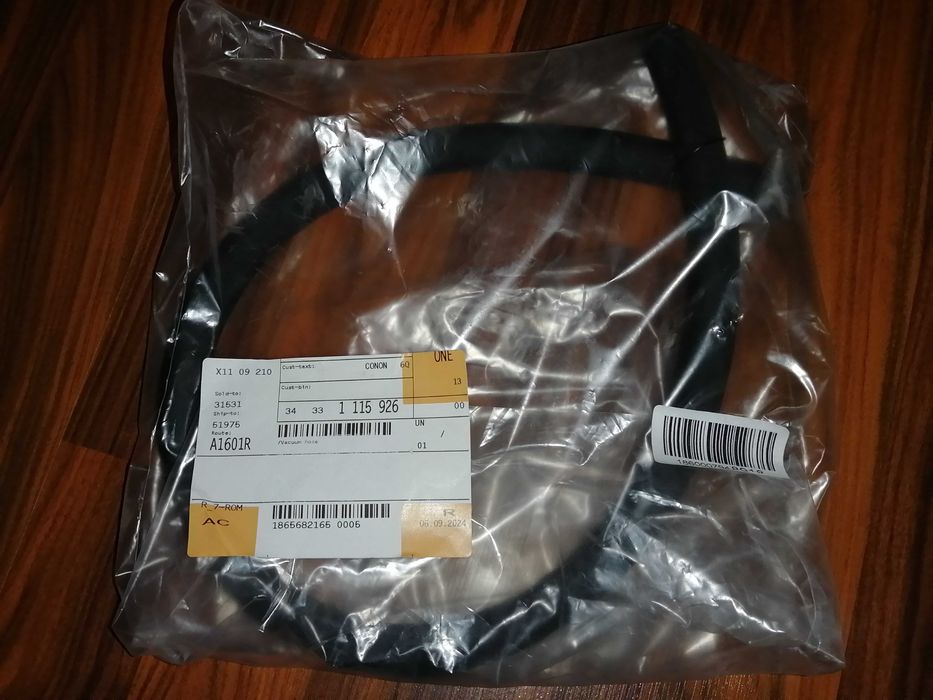 Furtun vacuum Bmw original și set rulmenți puntea față