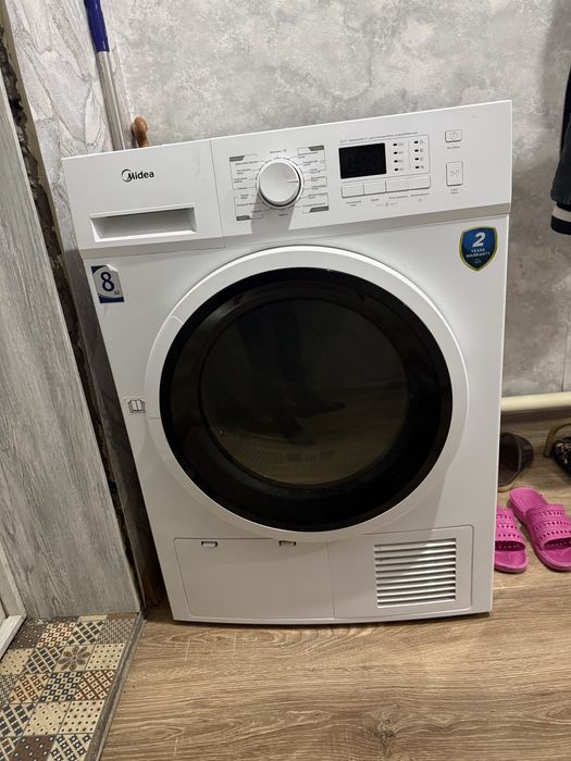 Сушильная машинка Midea.