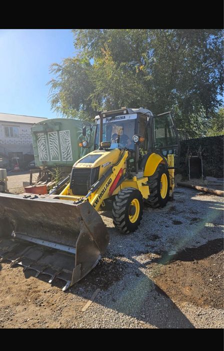 Услуга экскаватор погрузчтк