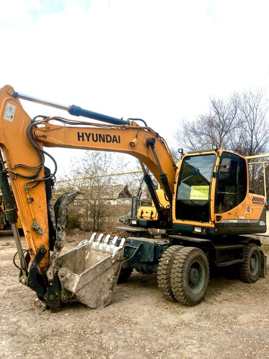 Колесный Экскаватор с Гидромолотом