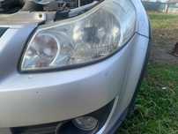 Far de Suzuki Sx4