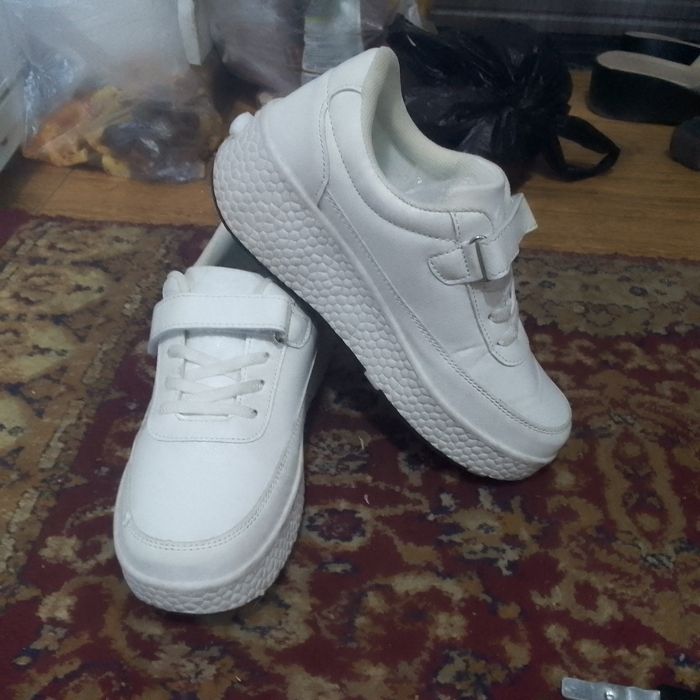 Роликовые кроссовки почти новые