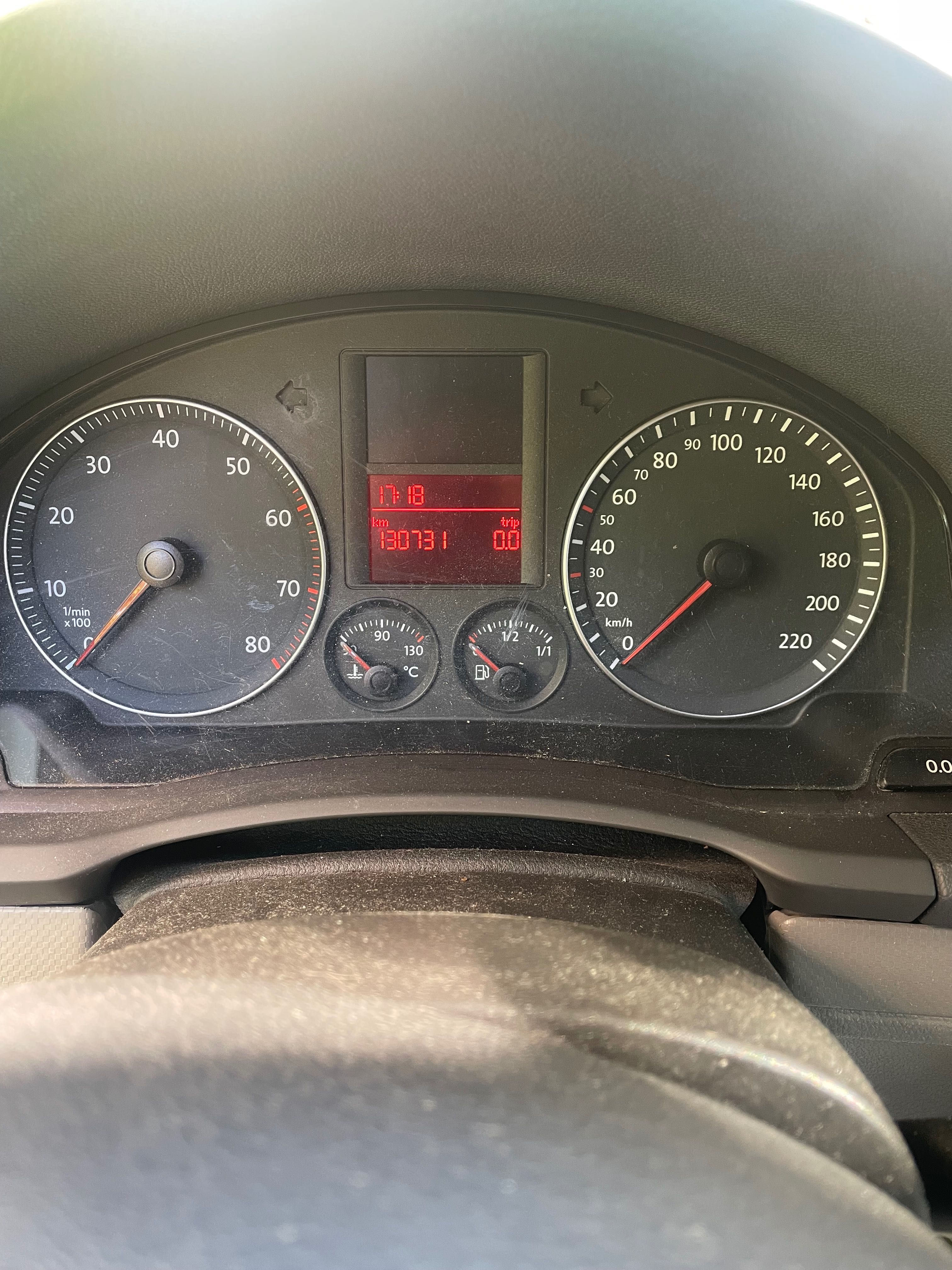 Golf 5 , 1.4 на 130х.км.