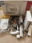 Consola Wii + 2 telecomenzi + 1 nunchuck + 1 Motion plus adaptor
