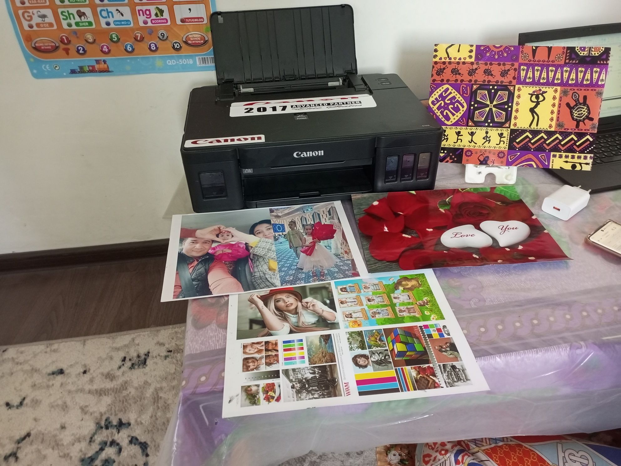 Canon rangli printr rasmga eyibor bering shu printer zaprafka qilingan