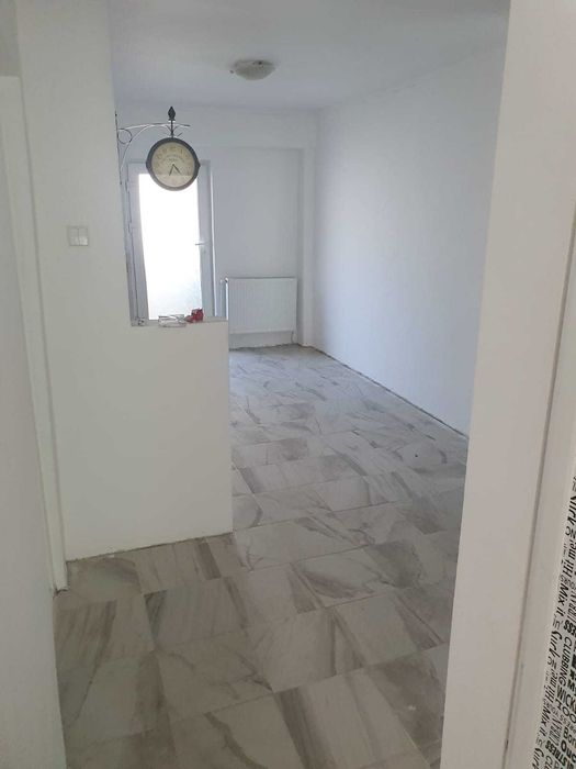 Închiriez apartament 3 camere parter