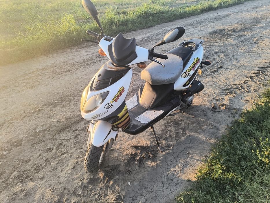 Vând scuter in 4 timpi și bicicleta copii