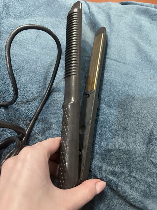 Плойка для выпрямления волос.