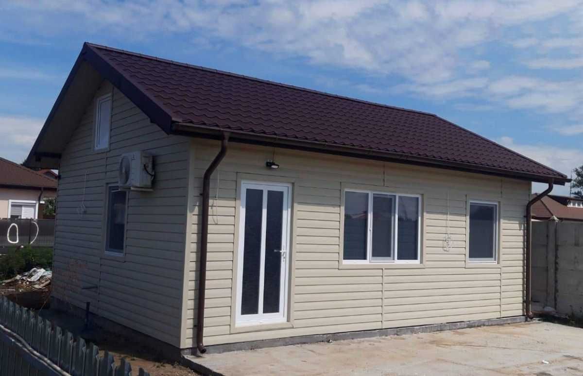 Casa, garaje auto pe structura metalica si panou sandwich termoizolant