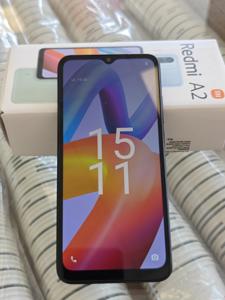 Xiaomi Redmi A2 + подаръци - кейс и слушалки.