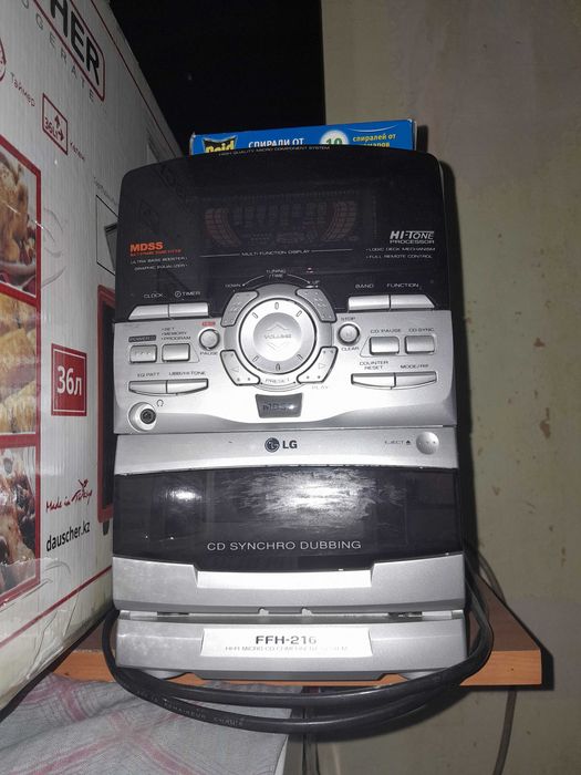 Продаю музыкальный центр LG