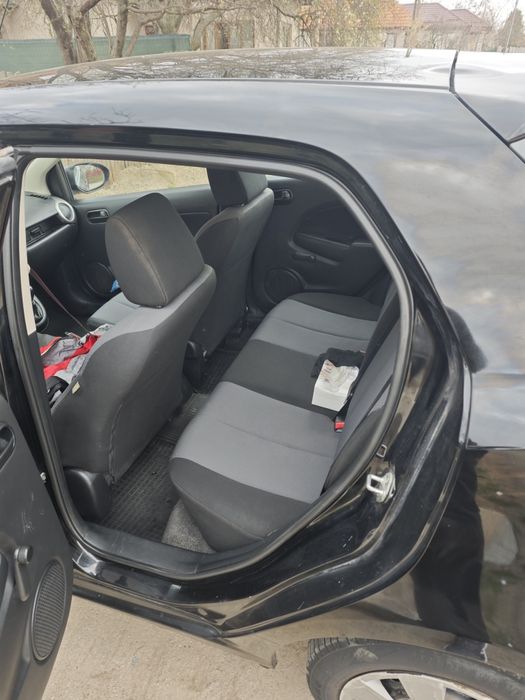 Mazda 2  benzină sau schimb