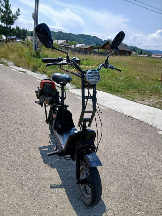 Vând scuter cu motor de cositoare