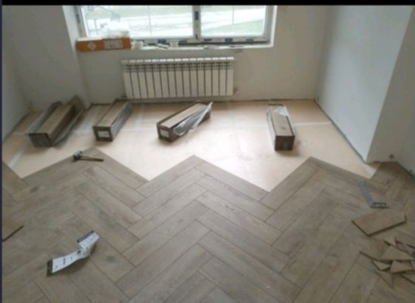 Укладка ламината, линолеума Sps панели кварцвинил ёлочка наливной пол