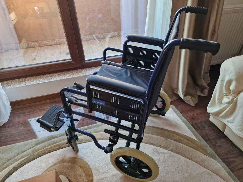 Scaun cu rotile pliant ptr transport varstnici sau dizabili - ca nou !