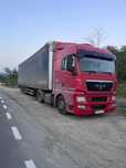 Man TGX+semiremorca Schmitz
