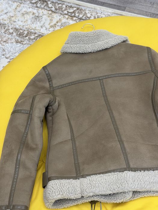 Женская дублёнка…….