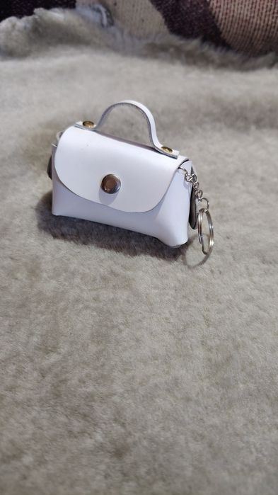 Mărturii de nunta sau botez gentuță din piele naturala lucrate manual