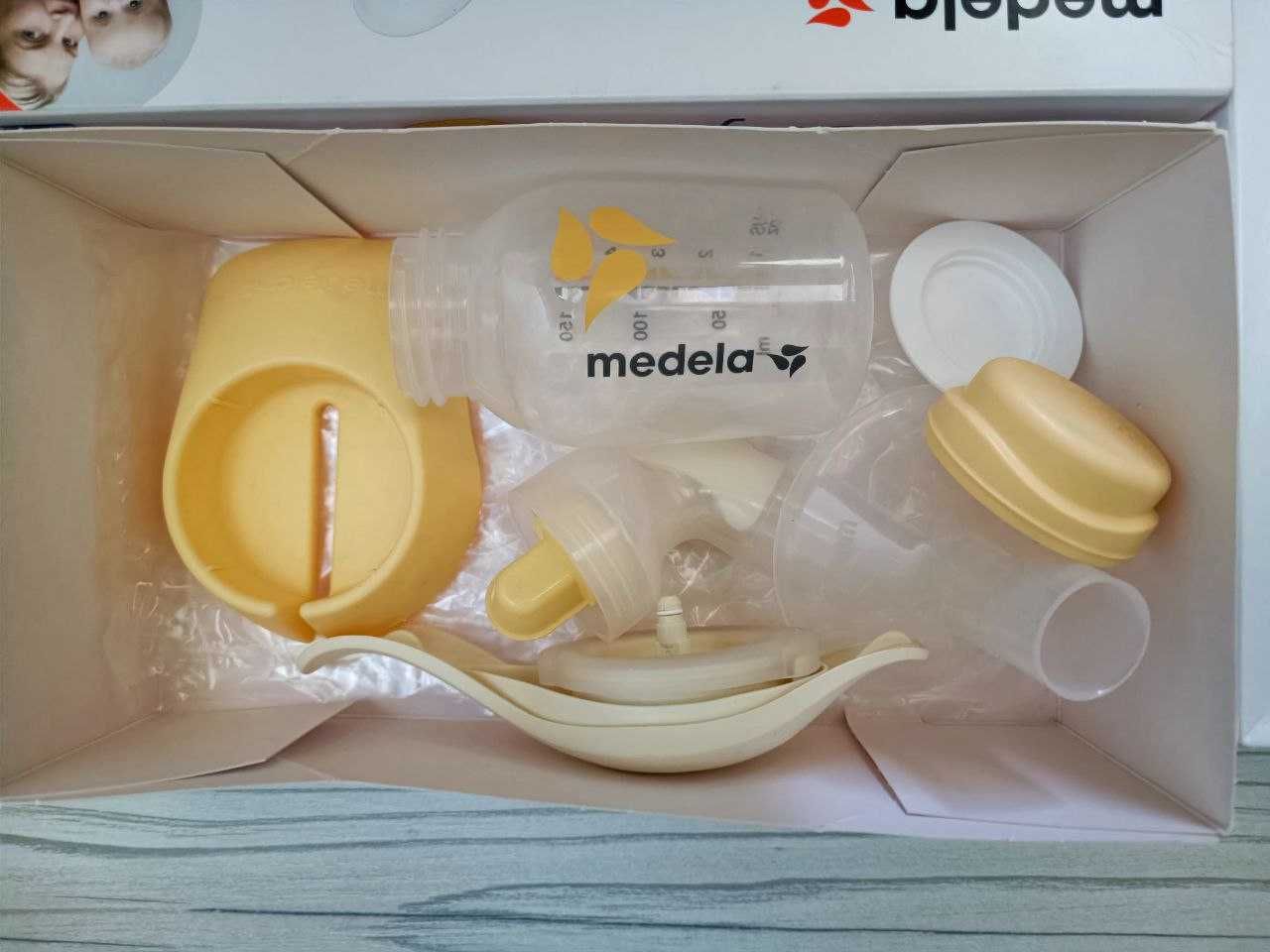 Молокоотсос MEDELA  ручной двухфазный,