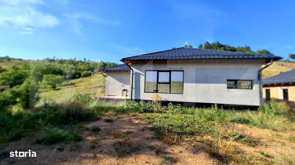 Casa pe un nivel, cu teren 2997 mp, panorama superba,Suceagu