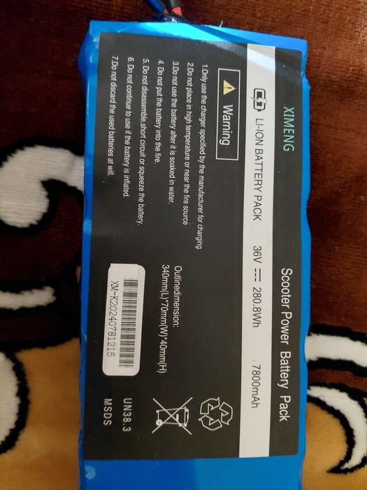 Vând baterie li-ion 36v 7800Ah nefolosita + încărcător .