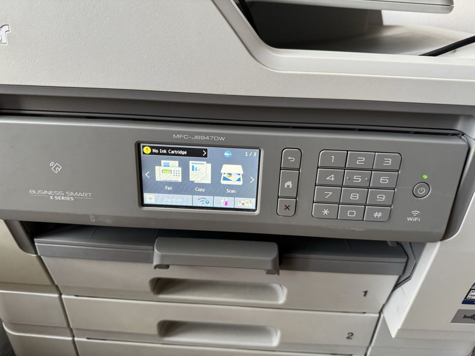 Принтер и скенер Brother