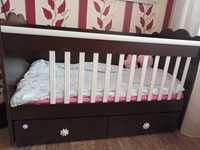 Бебешко дървено легло