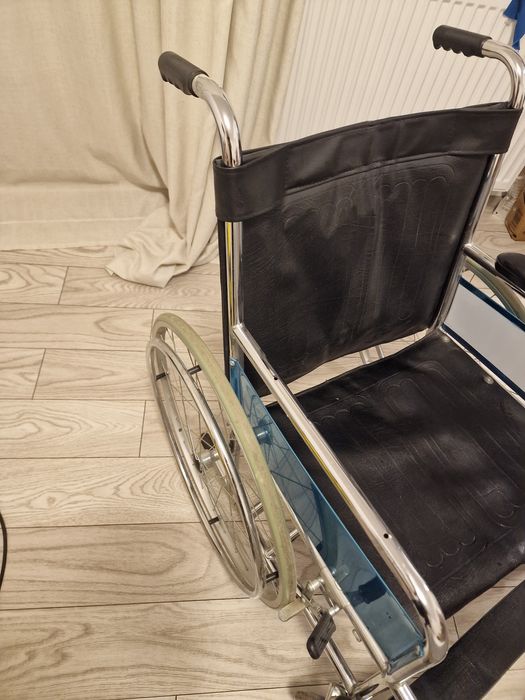 Carut pentru persoane cu handicap de miscare