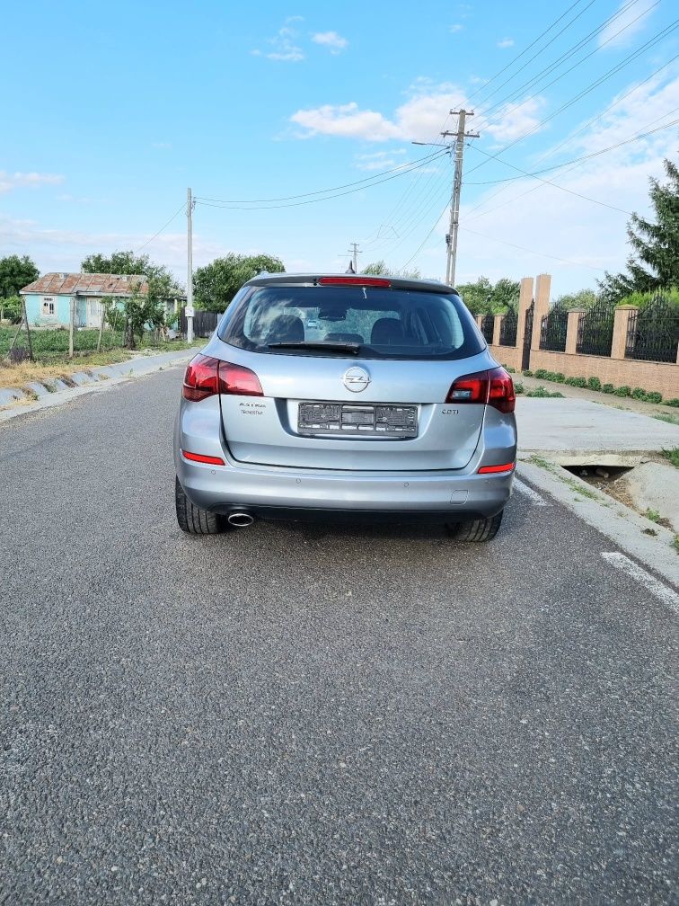 Opel  astra  2,0  Recent   Adus   2012