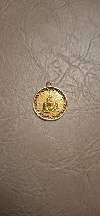 aur 14k.medalionAre 3 gr.pretul pe gram 350