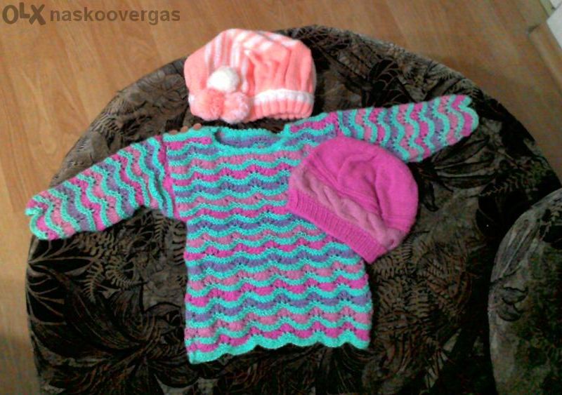 Ръчно изплетени бебешки дрехи