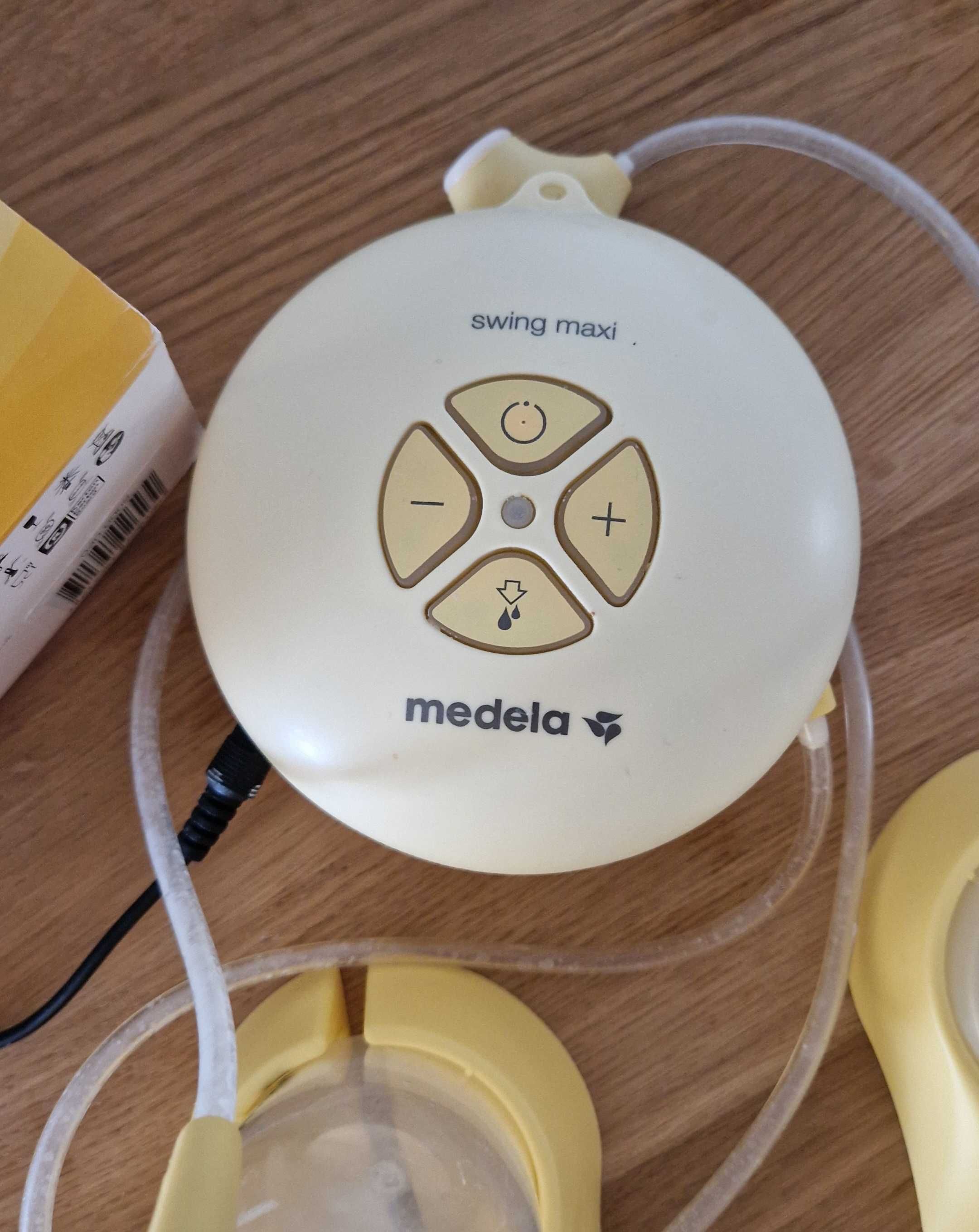Medela swing maxi & calma двуфазна електрическа помпа