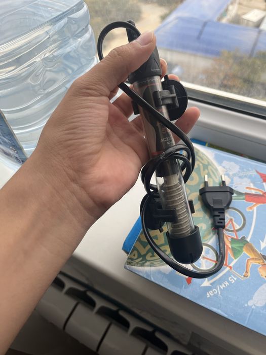 Прдам аквариум ный обагриватель на 35 литров