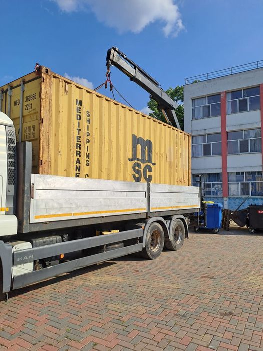 Transport materiale construcții cu macara