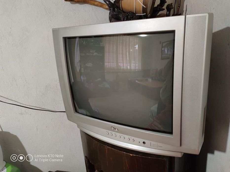 Телевизор .