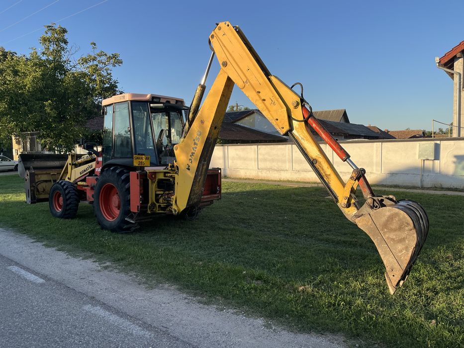 Buldoexcavator komatsu wb97R
