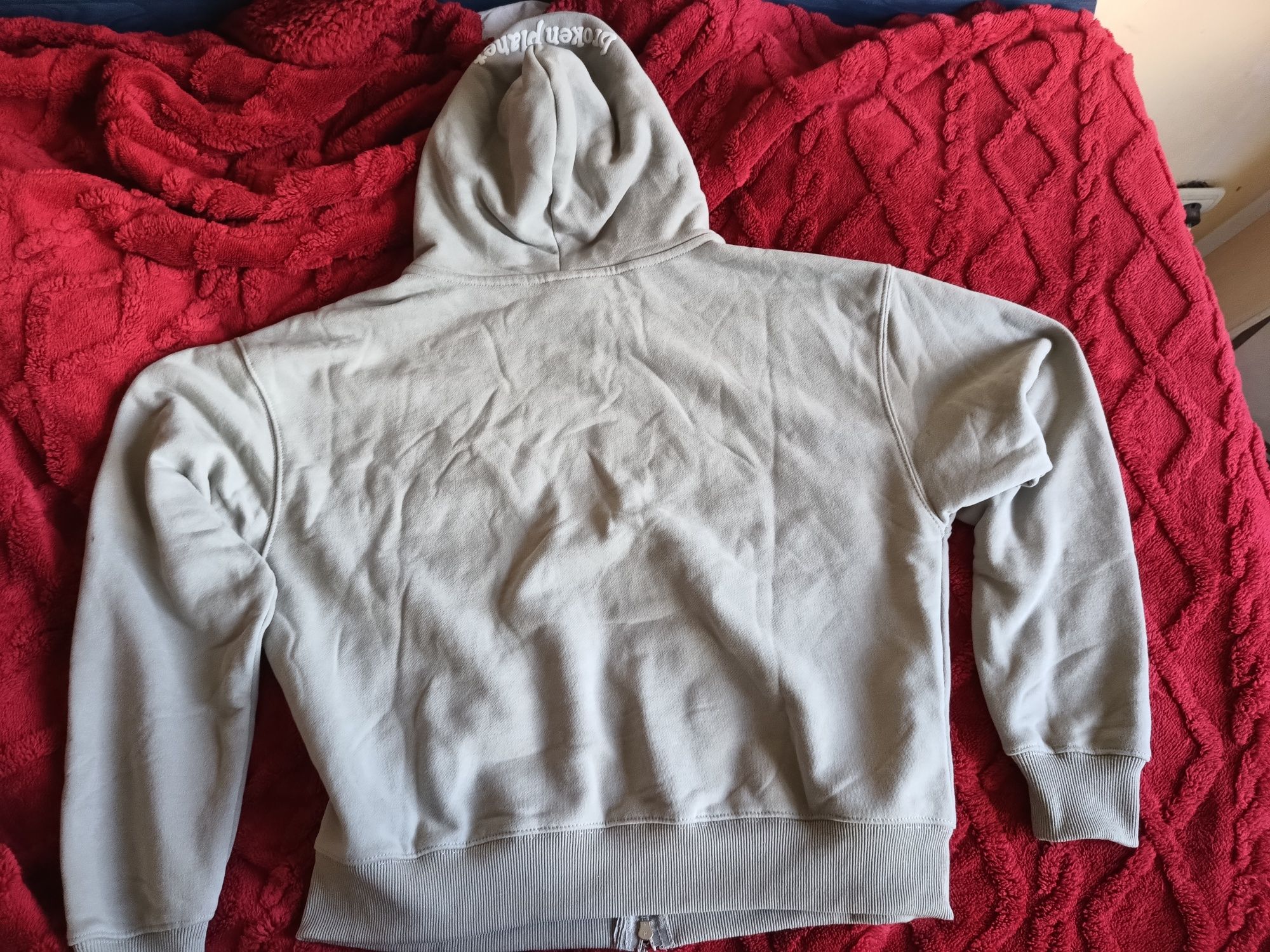 Broken planet zip up