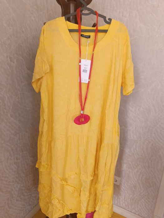 Платья большимерка жёлтого цвета