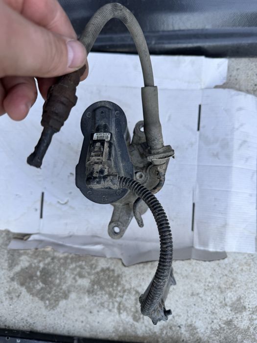 Etrier cu motoras electric stanga spate pt vw passat b6