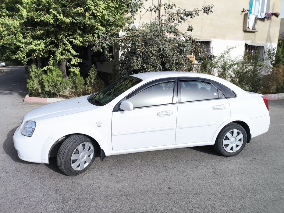 Ласетти 1.8 белый, мкп, 76800км, 2012 г.