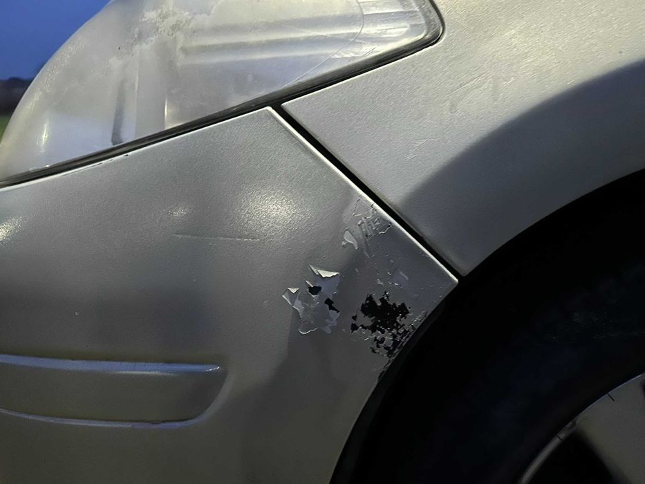 Nissan Tiida - Aproape de pomana