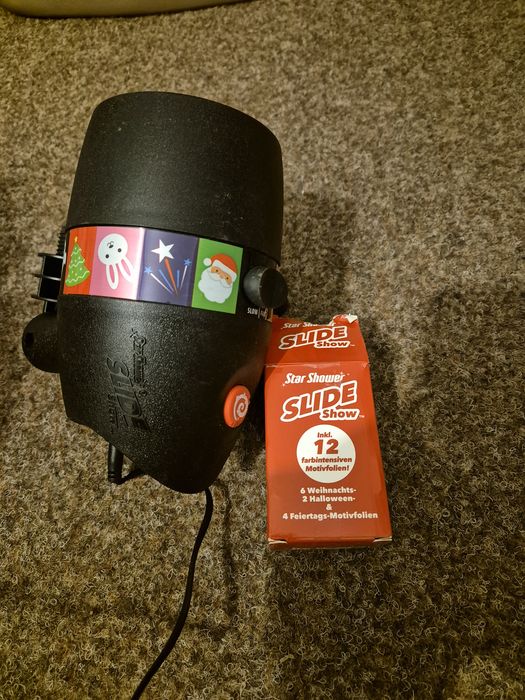 Vand proiector Slide shower cu 12 diapozitive de.sezon