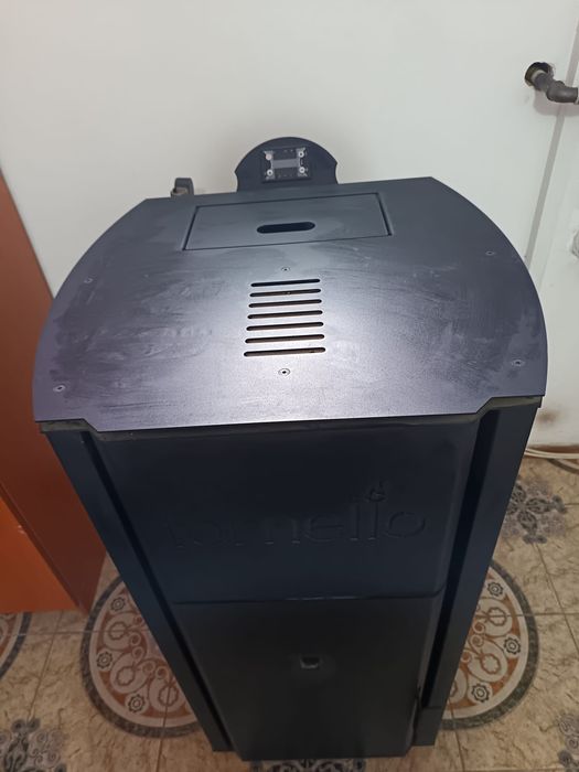 Vând centrala peleti