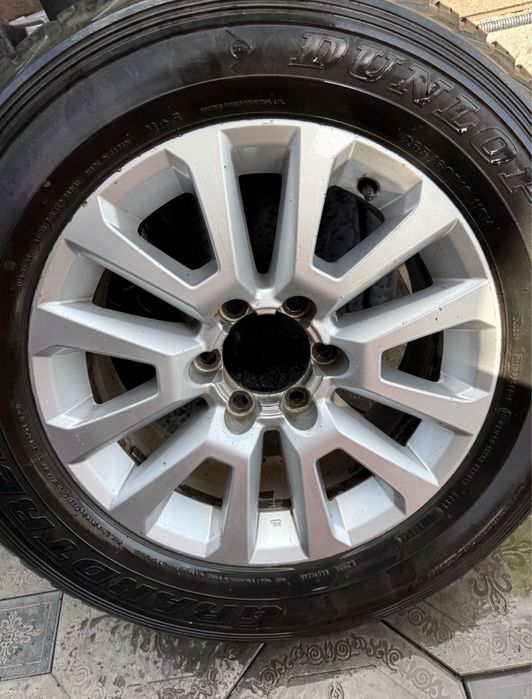 Оригинальный запасной диск с резиной Dunlop на Prado Прадо R18