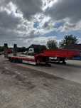 Trailer Fliegl cu rampe hidraulice